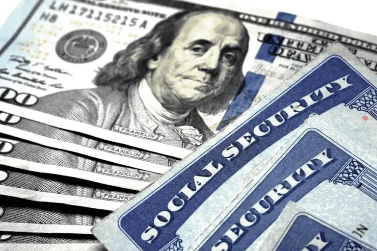 Money and Social Security Cards for identification and retirement USA
